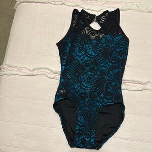 Kandi Kouture.  Blue/black lace one piece.  Child large 7/8